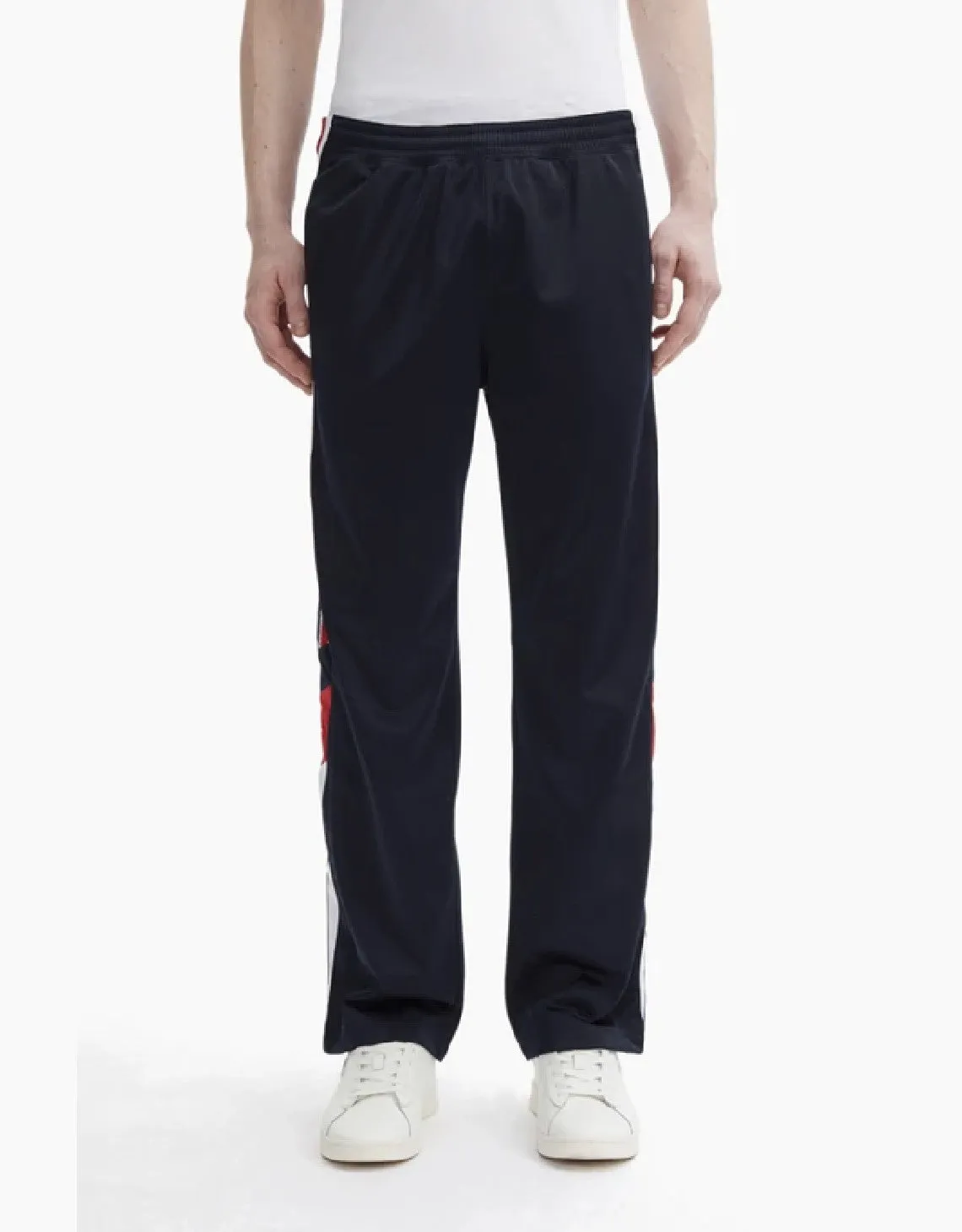 CHAMPION EUROPE<br>ARCHIVE JACQUARD LOGO TAPE TRACK PANTS NAVY